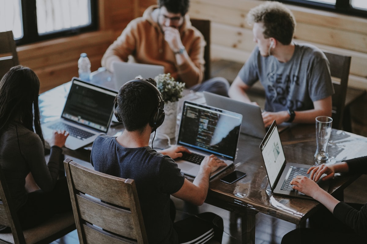 Collaborative startup team planning AI rollout